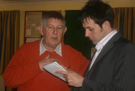 Ken Fox talking to a reporter