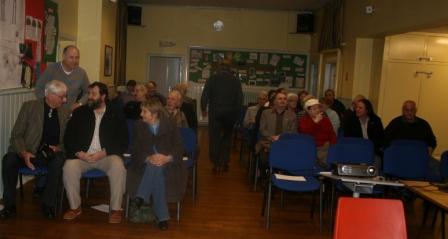 Audience eagerly awaiting the start of the viewing