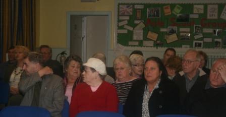 Audience eagerly awaiting the start of the viewing