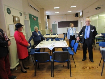 Mr Harry Moses welcoming the Lord Lieutenant into the village hall