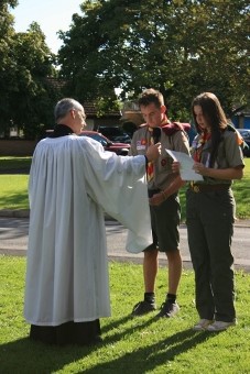 Scouts reading the names on the War Memorial in Aycliffe