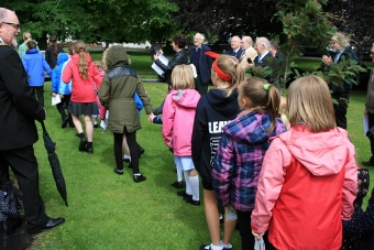 Pupils depart singing "it's a long wat to Tipperary"